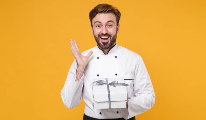 chef holding a gift