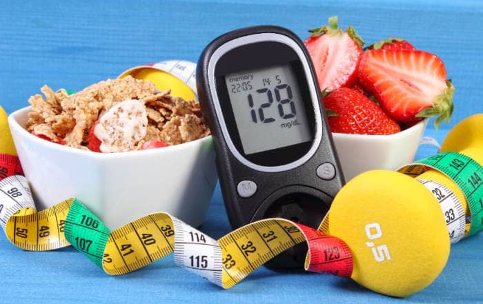 Diabetes monitor healty food tape measure and weights for lifting