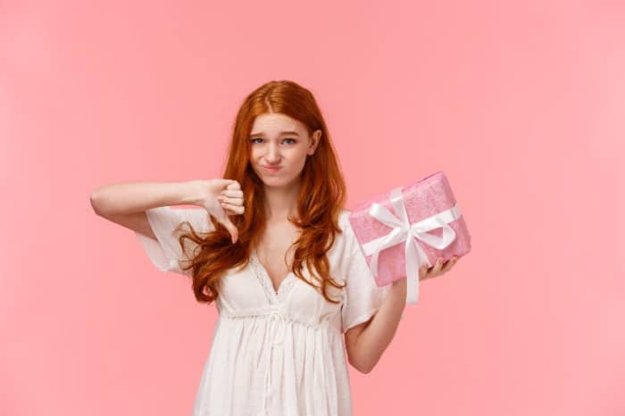 red head woman being picky about gift